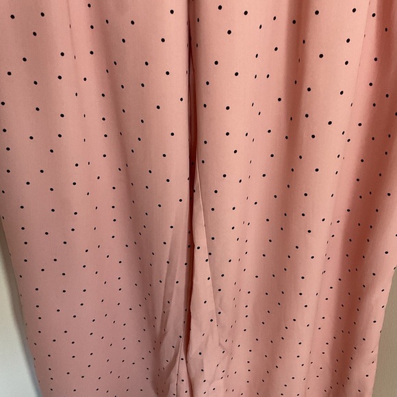 27. Wide-leg style with a black polka dot pattern and a self-tie waist detail 3X - Picture 3 of 9